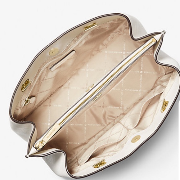 MICHAEL KORS LIGHT CREAM COLOR
Teagan Large Pebbled Leather Shoulder Bag - Picture 3 of 3